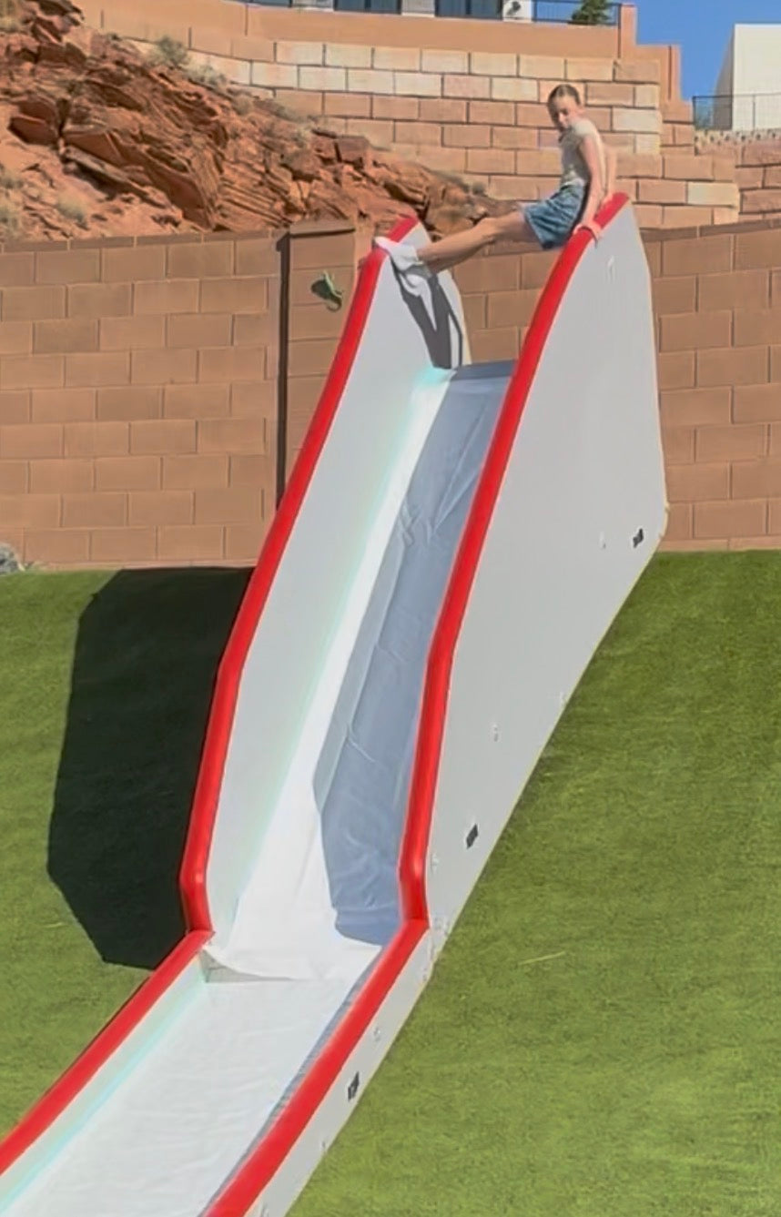 The Drop-In inflatable entry ramp slide